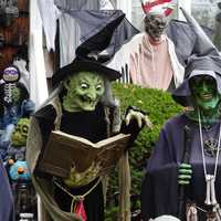 <p>Witches are among the scary life-sized figures that speak and move at a Waldwick house.</p>