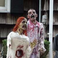 <p>Creepy, bloody figures draw many people to a Waldwick yard.</p>