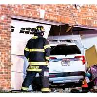 Motorist Freed By Firefighters After Crashing Into Her Hasbrouck Heights Home