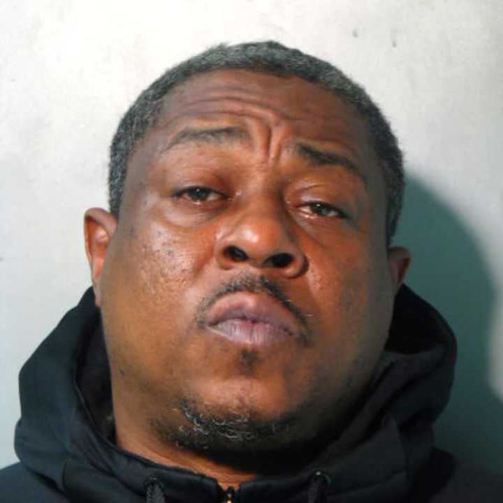 Tracy Hammond of Hempstead, 49, was arrested after he allegedly used a stolen identity and credit card to purchase a package at the United States Postal Service.