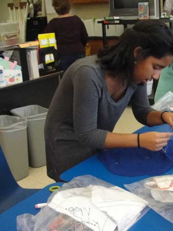 Irvington Middle School Students Hand Stitch Cartoon Pillows