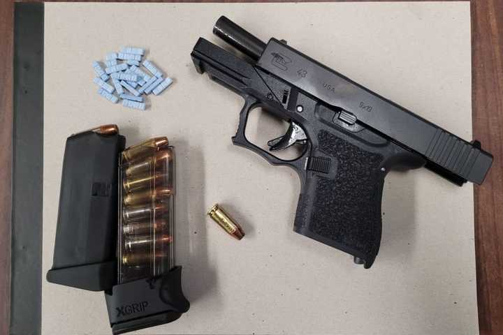 Man Arrested After Handgun Found During Area Traffic Stop, Police Say