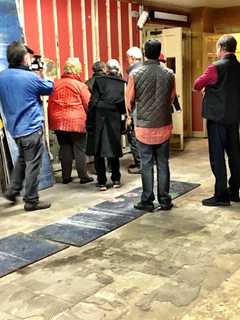 Visitors Don Hard Hats For New Bedford Playhouse Tour