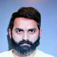 Man Charged With DUI After Car Crashes Into Fence In New Canaan, Police Say
