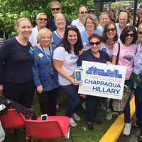 <p>Hillary Clinton poses for a photo with a group of local supporters in downtown Chappaqua.</p>