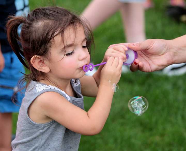 Children enjoyed the simple pleasures at the Family Fun Night at the Hillsdale Summer Concert Series.