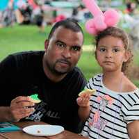 <p>Families enjoyed eating their cookie crafts at the Hillsdale Summer Concert Series.</p>