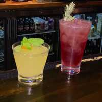 <p>Left to right: holiday cocktails at the Ho-Ho Kus Inn: Sugar Cookie Martini, Pomegranate Rosemary Collins, Clementine Mint Fizz and Chai Spiced Butter Rum.</p>