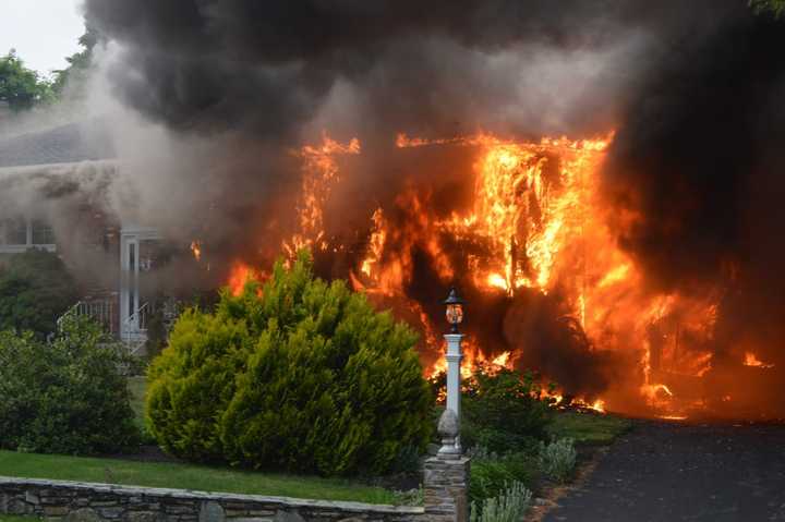 Police arrested a 32-year-old man and charged him with starting a fire in Holden that injured two people and severely damaged a home on Tuesday, June 6.