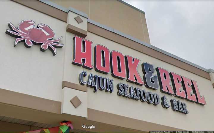 Hook &amp; Reel Cajun Seafood &amp; Bar sign