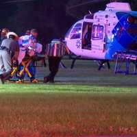 <p>One of the wounded being transported to the helicopter.</p>