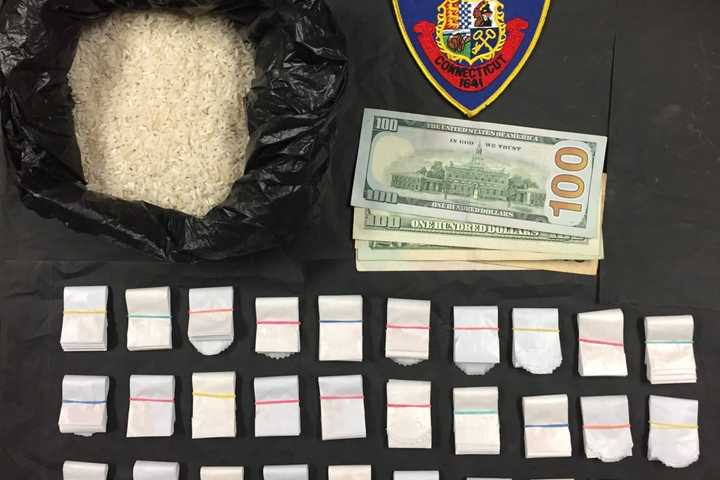 Stop Of BMW At Stamford Hotel Nets Suspects With 300 Bags Of Heroin