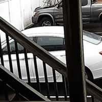 <p>Ilidio Carvalheiro, shown on the day he went missing, with his white Honda Accord.</p>