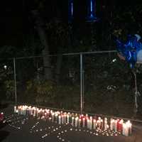 <p>Dozens of people turned out for a vigil of a Norwalk teen killed in a car crash.</p>