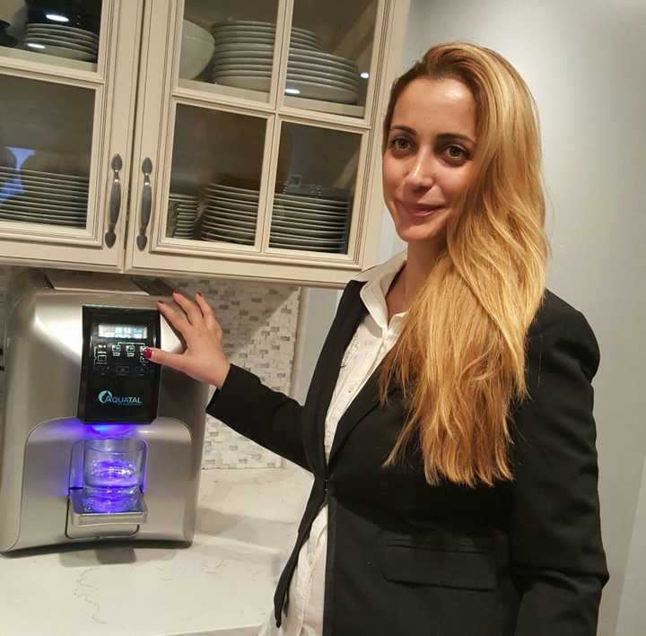 Adi Oren of Fair Lawn with her Aquatal countertop water dispenser.