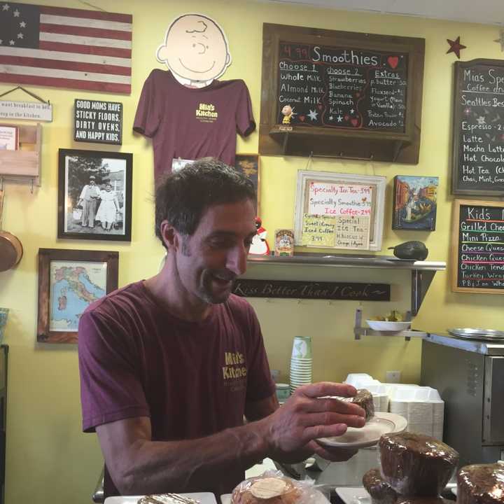 Michael Narciso, a Suffern resident and co-founder of Mia&#x27;s Kitchen, serves up one of Mia&#x27;s many gluten free baked good options.