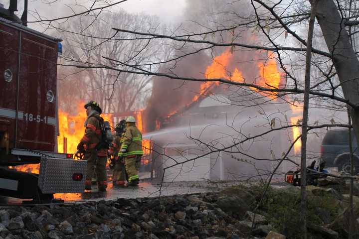 It was a busy afternoon for firefighters who rushed to battle a brush fire and a separate house fire in Mahopac.