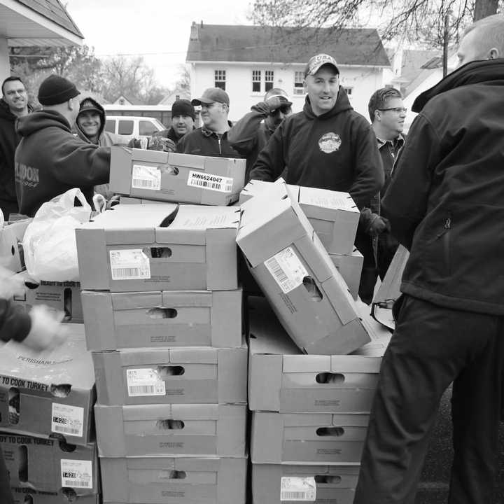 The Hackensack Fire Department donated 100 turkeys to the Center for Food Action.