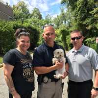 <p>Lysa DeLaurentis (Garfield&#x27;s animal control officer), Leonia Police Sgt. Chris Garris and Detective Michael Jennings with Maggie.</p>