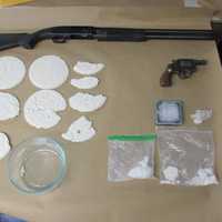 Couple Charged After Cash, Drugs, Weapons Seized At Home 100 Feet From Long Island HS