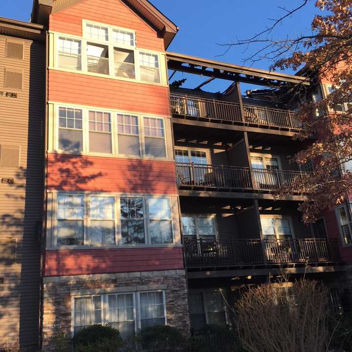 A total of 54 units were deemed uninhabitable after a fire ripped through the StoneWood Condominium Complex at 100 Richards Ave. in Norwalk on Monday. All the residents of the complex have been displaced. Damage can be seen on the top floor.