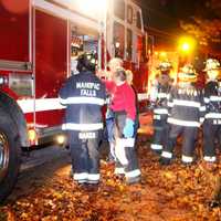 <p>Past Chief Ann Link covers the staging area assigning firefighters to crews and keeping the board that identifies where any firefighter is at any given moment.</p>