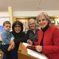 <p>Jane Bryant Quinn, far right, with, from left: Tyler Praino, Marjorie Sobylak of North Salem and Chappaqua resident Carolyn Reznick of Ruth Keeler Library on Sunday.</p>