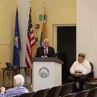 <p>Westport First Selectman James Marpe reads a Veterans Day proclamation during Veterans Day services at Westport Town Hall.</p>