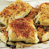 <p>Savory cheese rolls, or borkes: Spinach or beef with cheese baked in a flaky filo dough.</p>