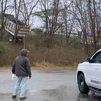 <p>The dump truck ended up stuck atop the embankment off northbound Route 287 in Mahwah.</p>