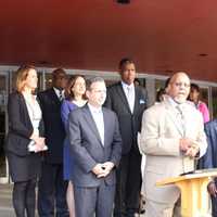 <p>The Rev. Lindsay E. Curtis, pastor of Grace Baptist Church in  Norwalk, begins a press conference on the steps of his church.</p>