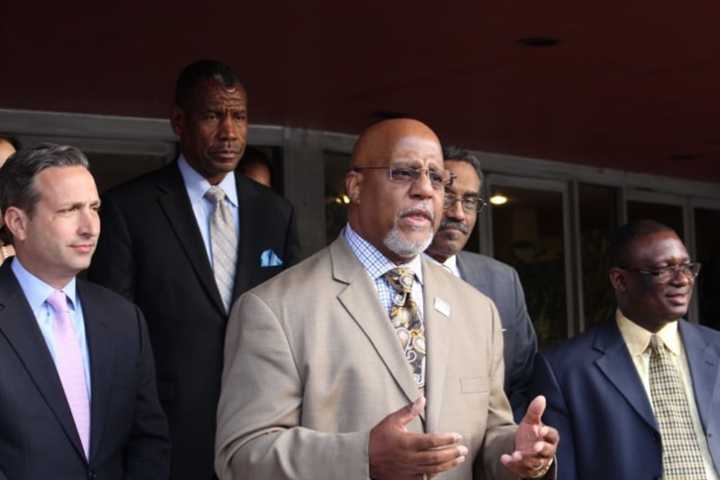 The Rev. Lindsay E. Curtis addresses the media during a press conference in which faith leaders called upon Connecticut&#x27;s legislators to act on revising the state&#x27;s formula for allocating education funding.