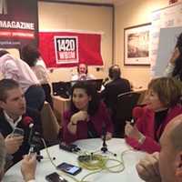 <p>Eric Trump, far left, talk to Lisa Wexler, at right.</p>