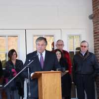 <p>Phil Lauria, chairman of the Wilton Commons GP Board of Directors, welcomes guests to the ribbon cutting ceremony for Wilton Commons Congregate.</p>