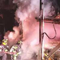 <p>Flames damaged at least two vehicles in the car carrier fire on northbound Route 17 near Hollywood Avenue in Ho-Ho-Kus.</p>