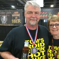 <p>Tom and Diane Slosser love all things hot sauce at their Monroe shop The Angry Pepper.</p>