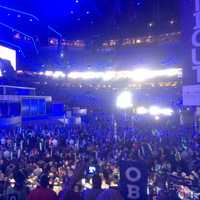 <p>Delegates stand on the floor of the Democratic National Convention in Philadelphia Wednesday as President Obama takes to the main screen.</p>