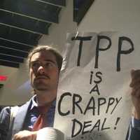 <p>A protestor at the Democratic National Convention in Philadelphia Wednesday holds up a sign.</p>