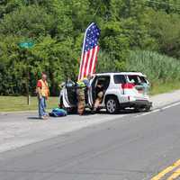 <p>Firefighters render care as EMS arrives on location.</p>