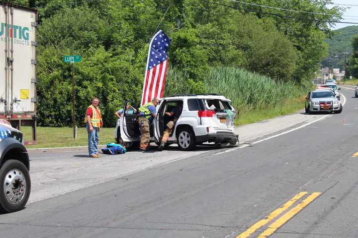 Firefighters render care as EMS arrives on location.