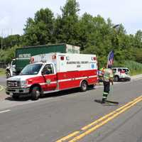 <p>Mahopac ambulance crew loads patient for transport to the hospital.</p>