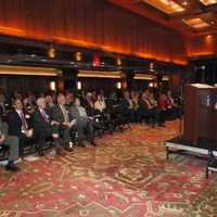 <p>Jim Tedesco speaks to crowd of mayors at the Bergen County Economic Development Conference at Metlife Stadium.</p>