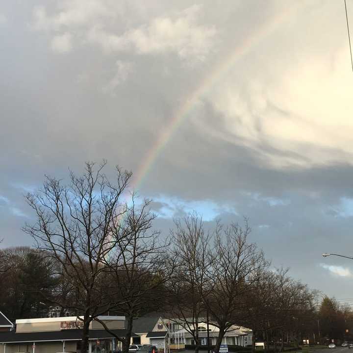 A rainbow breaks through the clouds after storms on Thursday in Westport.