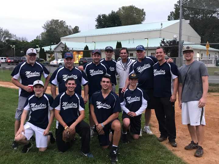 Fathers and sons on the Cresskill Maulers gather together after a recent win.