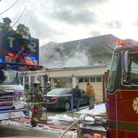 <p>The fire spread quickly along the Llewellyn Avenue side of the Lafayette Avenue home in Hawthorne.</p>