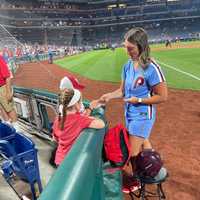 <p>Fleck even has her own baseball card, which she signs and hands out to fans during the game. She also distributes “rally towels” to fans, while also selling 50-50 raffles to raise money for Philadelphia-based charities.</p>