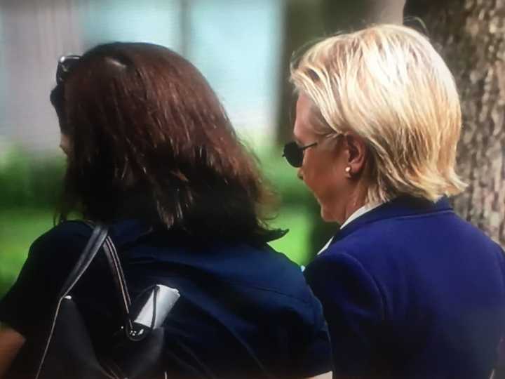 Hillary Clinton, right, at the 9/11 ceremony on Sunday morning.