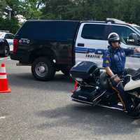 <p>Linden navigates through a cone course outside of Paramus police headquarters.</p>