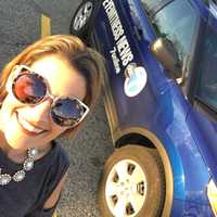 <p>Annie Joachim snaps a selfie with the Channel 7 news van before her event.</p>