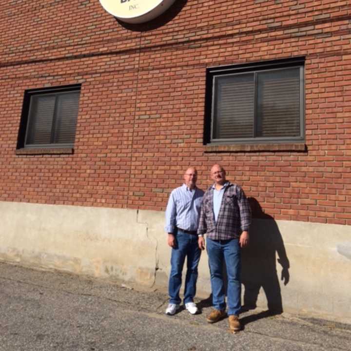 David and Stephen Mullany outside their Wiffle Ball factory in Shelton.